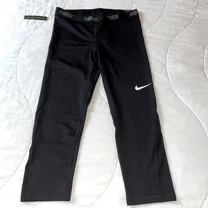 Brand new w tags- Nike training pants. The Nike: Victory Baselayer. Size L.